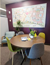 meeting table with art in background