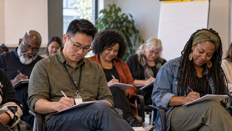 People taking a survey in a conference room